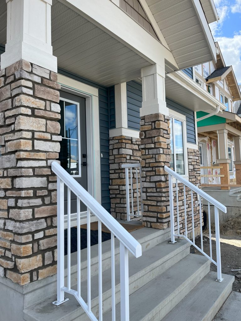 YEG Exteriors finished stonework and parging project in Edmonton