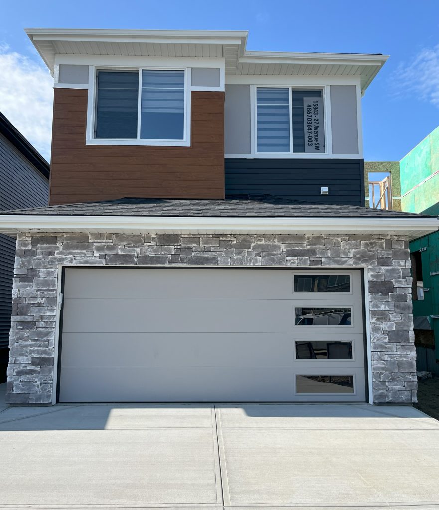 YEG Exteriors finished stonework and parging project in Edmonton